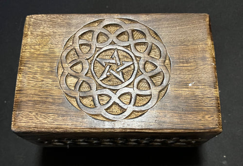 Carved pentacle in knot with side carving